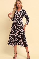 Robe midi imprimée boutonnée sur le devant avec ceinture